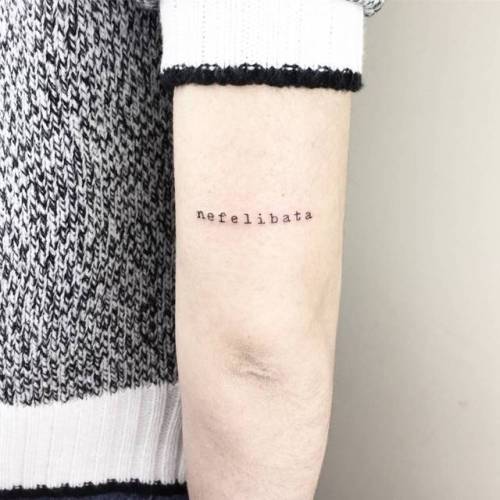 Tattoo tagged with: small, single needle, line art, tricep, tiny,  cagridurmaz, ifttt, little, typewriter font, minimalist, font, word,  nefelibata 
