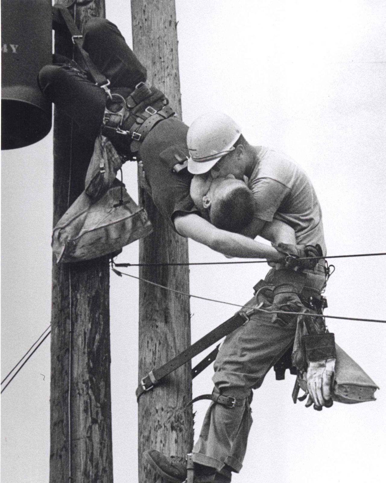 historium:
““The Kiss of Life” shows a utility worker named J.D. Thompson giving mouth-to-mouth to co-worker Randall G. Champion after he went unconscious following contact with a low voltage line, 1967. 1968 Pulitzer Prize, by Rocco Morabito
”