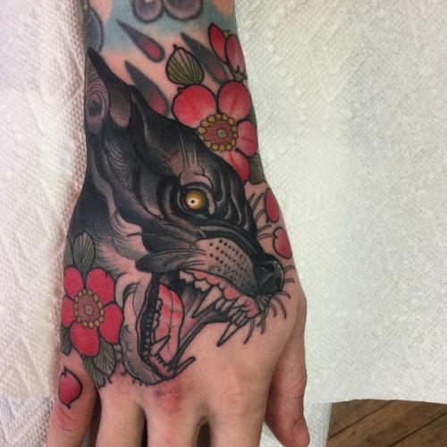Tattoo tagged with: flower, hand, neotrad, wolf 