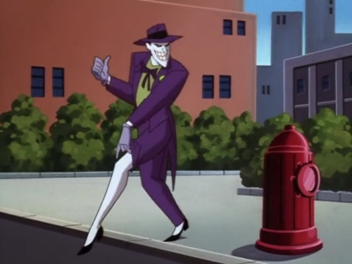 ziyal:
“this shot of the joker pulling up his pants leg seems to imply that the white part of his feet is actually just bare skin, not fabric spats over a pair of dress shoes, as i had always assumed?? which means that the animated series joker has...
