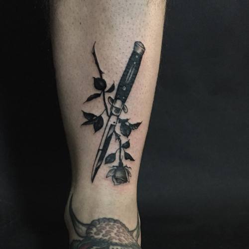 Tattoo tagged with: rose, knife, leg 