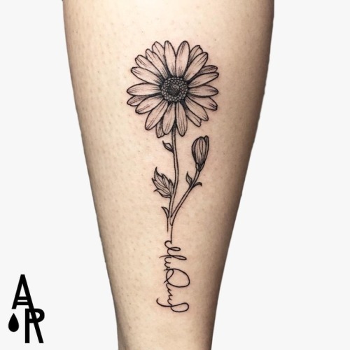 Daisy tattoo of a Flower Tattoo