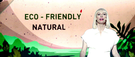 Animated GIF of Tilda Swinton advertising her super-pig meat as "eco-friendly, natural, non-GMO."