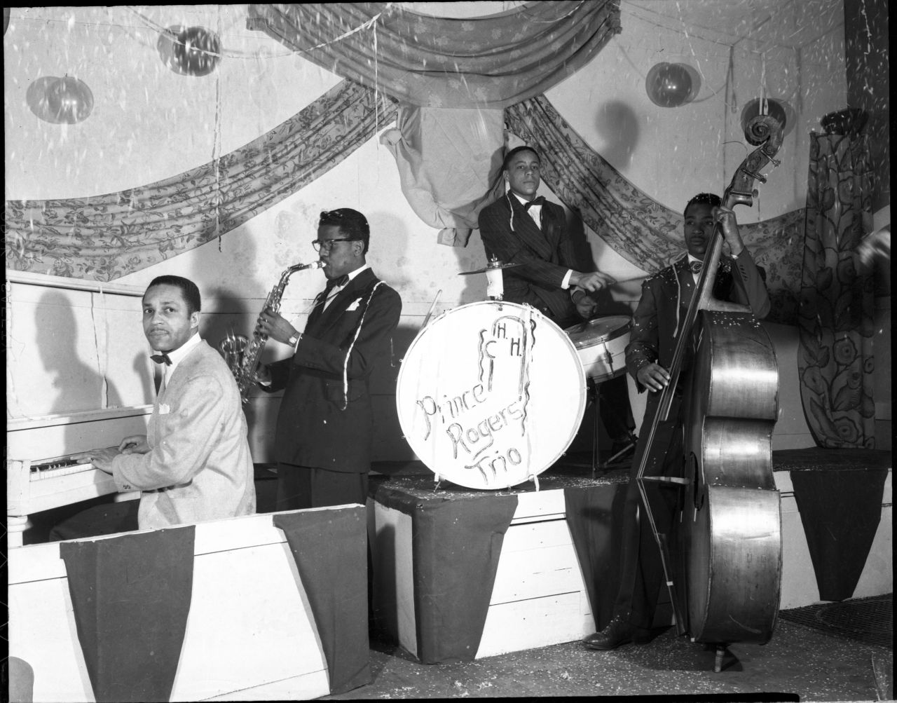 Prince Rogers Trio John Lewis Nelson (1916-2001) arrived in Minneapolis from Louisiana in 1948, and started the Prince Rogers Trio with other local musicians. Nelson (left, in the above photo) adopted “Prince Rogers” as a stage name and later gave...