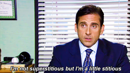 Michael Scott from The Office saying, "I'm not superstitious, but I am a little stitious."