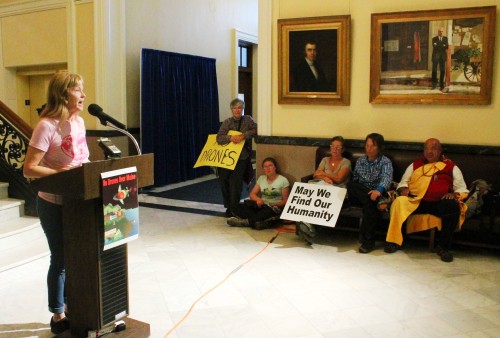 Rally at the end of the Maine #Drone Peace Walk in Augusta, State House (Capitol building) Hall of Flags. I’m wearing CODEPINK’s new DRONE-FREE ZONE t-shirt as I share Malala Yousefzai’s words to President Obama:
“Drone strikes are fueling terrorism....