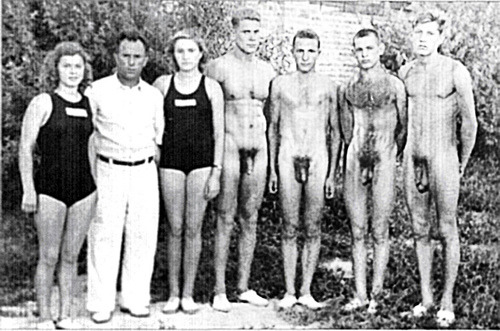 Nude high school competitive swimming took place in parts of the USA until the 1960’s. Boys swam nude, while girls wore suits. Did they put this in the yearbook?