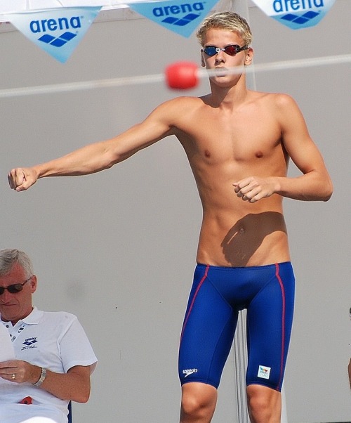 joegoat9: “ Athletic swimmer in blue speedo jammer swimtrunk. Warm up and get ready to race. I like his blue speedo jammer swimtrunk. It fits with his nice body. ”