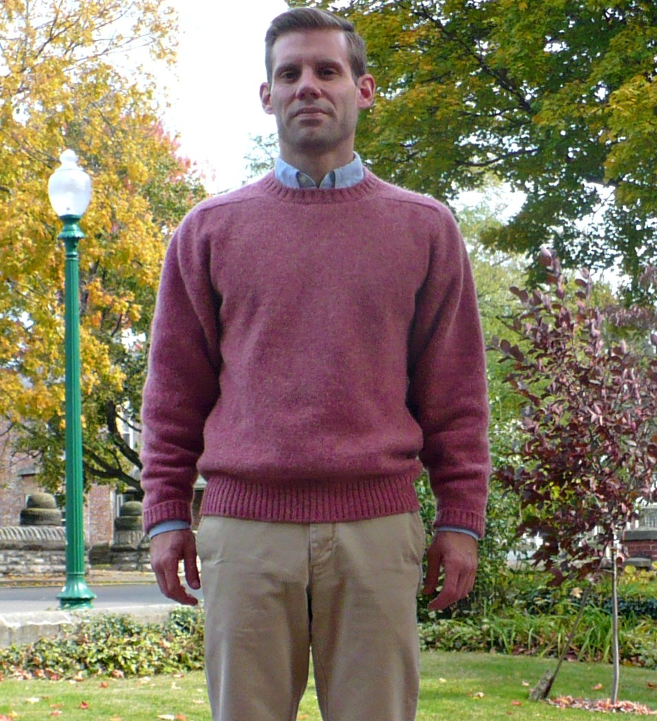 How do you shrink a wool sweater?