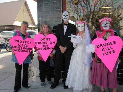 CodePINK Austin assembled a ‘wedding party’ for a Valentine’s week action. We walked through a busy shopping district with heart shaped signs related to the drone bombings of weddings. Here is an excerpt of the flyer we passed out:
“On December 12,...