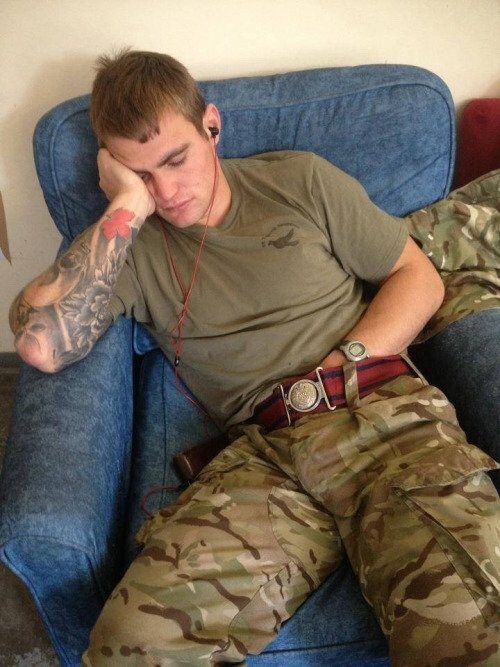 Sleeping soldier groping himself