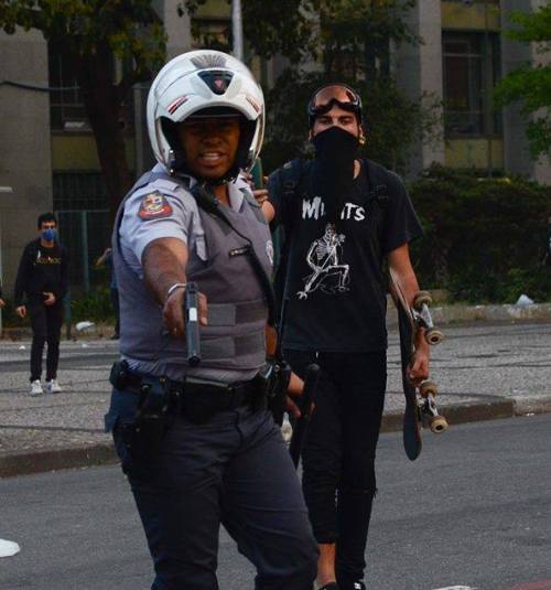 Photo taken by photoreporter Tércio Teixeira, seconds before a policeman shoots him with a gun. (Sao Paulo, Brazil) [September 7]