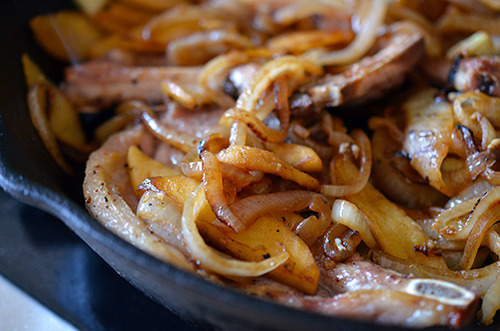 Caramelized onions in a cast iron pan.