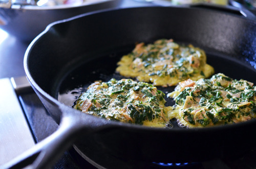 Frying patties of Curried Green Eggs & Ham in a skillet.