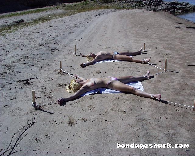 spreadeagle on bondage Naked beach out staked women