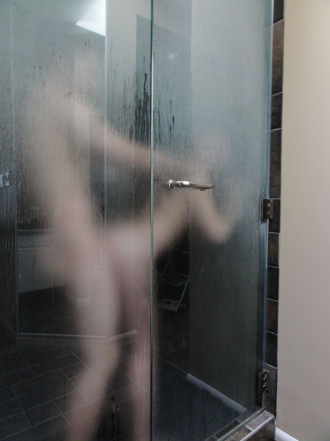 Striptease and masturbation in shower