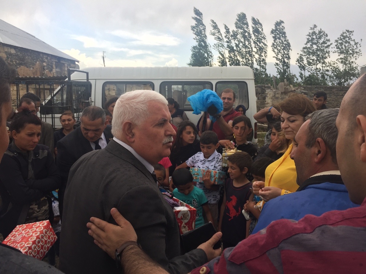 The second village that we visited was in Hasangaya, within a half a kilometer from Armenian occupied territory. The setting was much smaller then the first. Mr. Umud gave a speech and we handed out the shoeboxes.We noticed that the living...