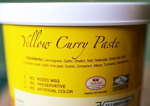 A closeup of the Whole30 ingredients listed on a Thai Yellow Curry Paste container.
