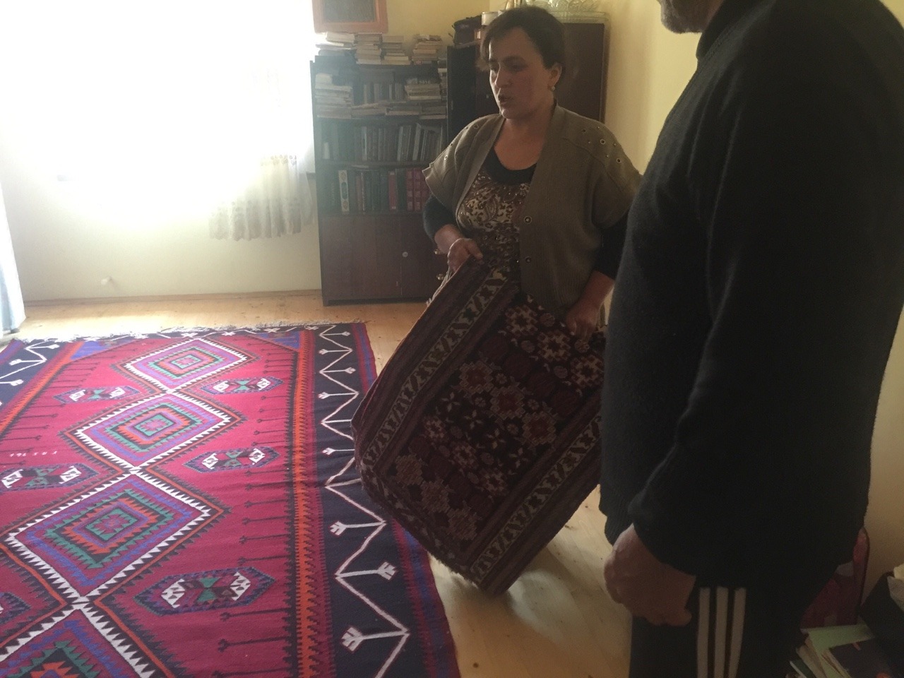 Meet Nezara. Of the households that we visited, her’s was the most full of skillfully woven carpets. Although Nezara and her mother in law were the only weavers in the family, they had been fairly successful selling to distributors in Baku.Her...