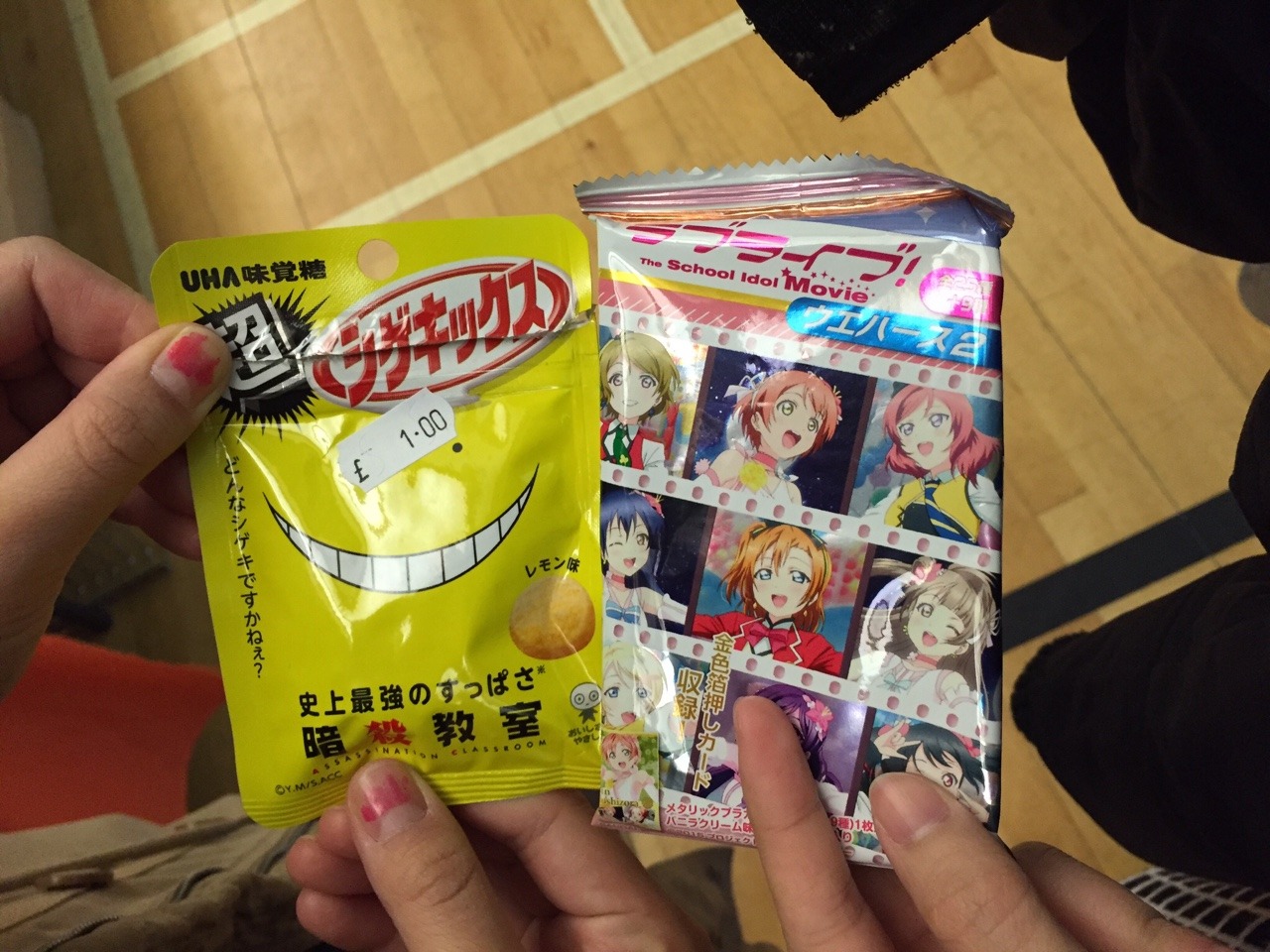 Yuri got an Assassination Classroom packet of candy while I got Love Live wafers