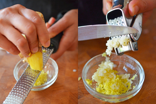 Grating ginger into a small bowl and adding in minced garlic.
