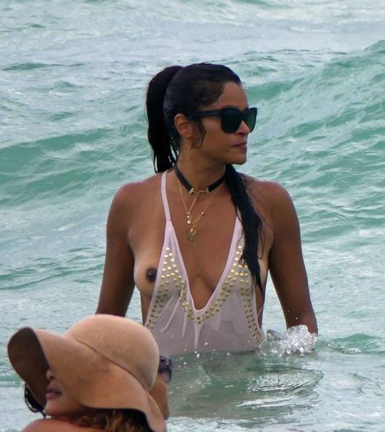 Claudia Jordan – Tit Slip Swimsuit Malfunction, Miami Beach, FLA, June 19, 2017