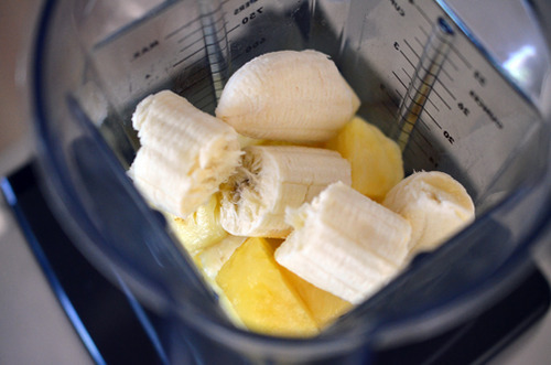 Pineapple and banana in a blender.