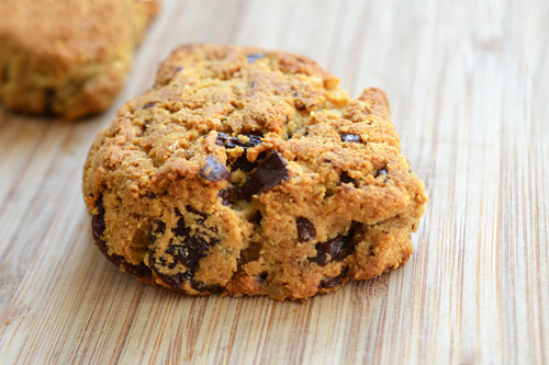 A close up picture of one Grain-Free Dark Chocolate Cherry Scones.