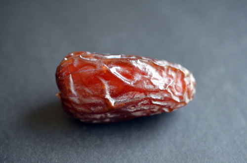 A closeup of a dried Medjool date.
