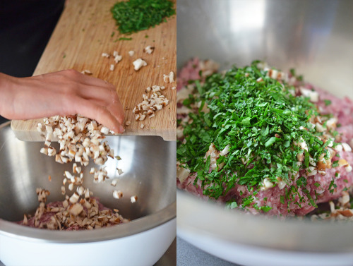 The raw ingredients of Lemon Ginger Meatballs being put in a large bowl.