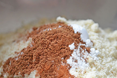 A close-up shot of the grain-free and gluten-free dry ingredients for Paleo Pumpkin and Carrot Muffins 