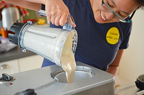 Pouring the chilled paleo and Dairy-Free Vanilla Ice Cream into the ice cream maker.