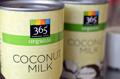 Two cans of coconut milk.