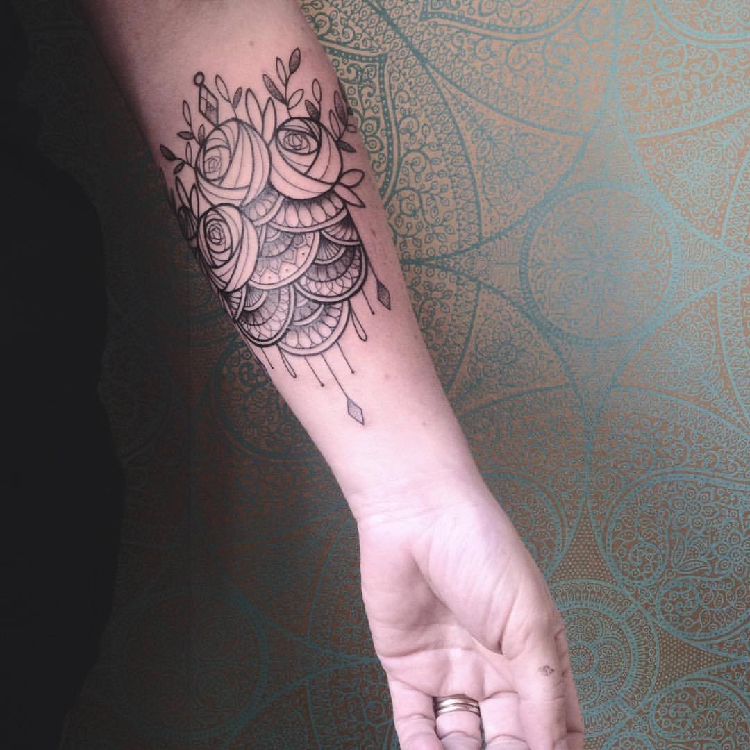 Ornamental flower tattoo by Caroline Karenine.