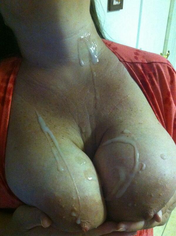 Breasts covered in spunk