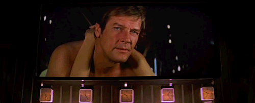 Image result for roger moore gif