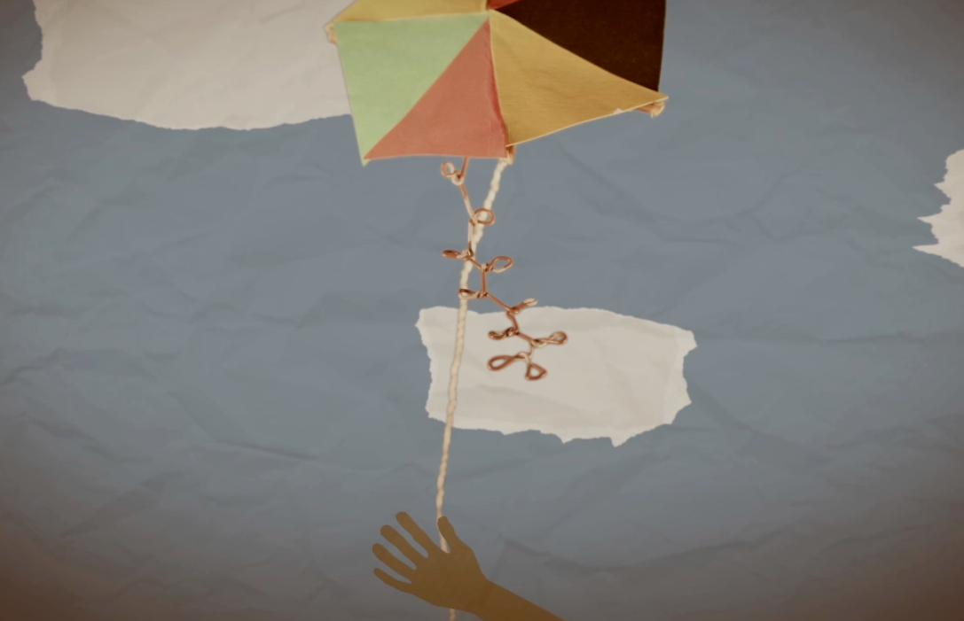 Image by Daniel Nienhuis Film Review: Flying Paper By Aisha Gani The silhouette of a child flying a homemade kite while running down a sandy path in the soft glow of the sun, and the voice of a young woman narrating a poem in Arabic sets the tone of...