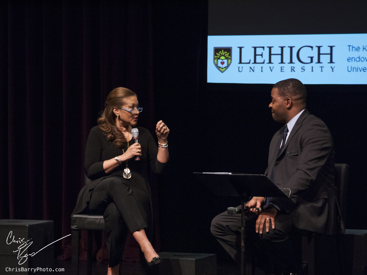Another photo of Michele Norris speaking with Dr. James Peterson, who began the discussion with Michele Norris about race