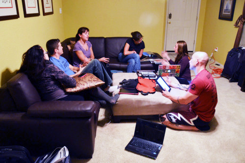 A group of paleo food bloggers sitting on a couch.