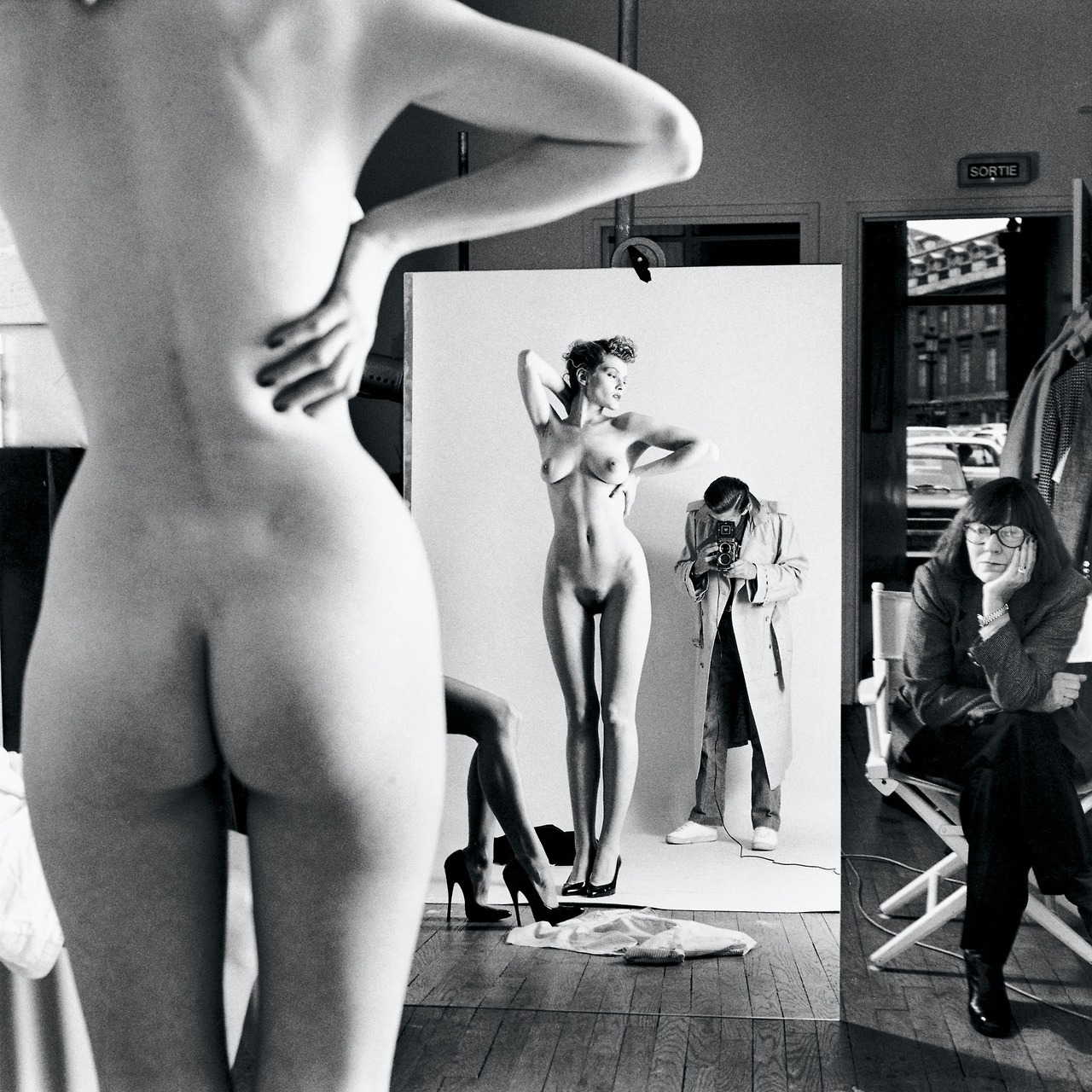 romantisme-pornographique:
“Helmut Newton, Self Portrait with Wife and Models, Vogue Studio, Paris, 1981. HQ.
”