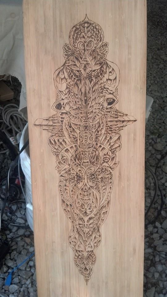 Pyrography on bamboo longboard 2014 Check out more art —-> Perpetual Design