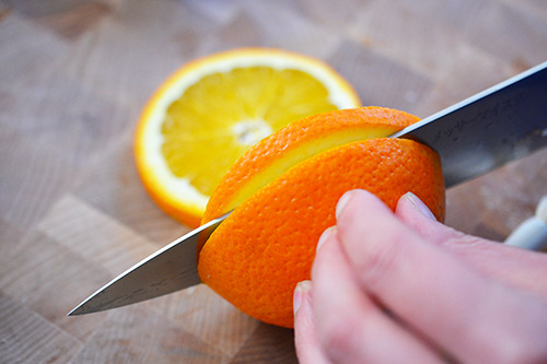 Thinly slicing an orange for Fish en Papillote (in Parchment) 