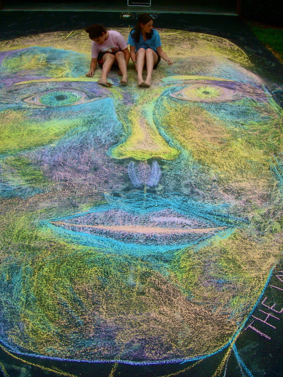 THE LOVE MAN. chalk on pavement. bye Rachel and Sydnie the final product. It was big