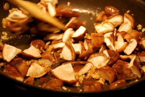 Stir frying shiitake mushrooms for the paleo recipe stir-fried shiitake and broccoli slaw.