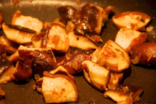 Close up of fried shiitake mushrooms.