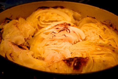 Cabbage in a Dutch oven after being braised in the oven.
