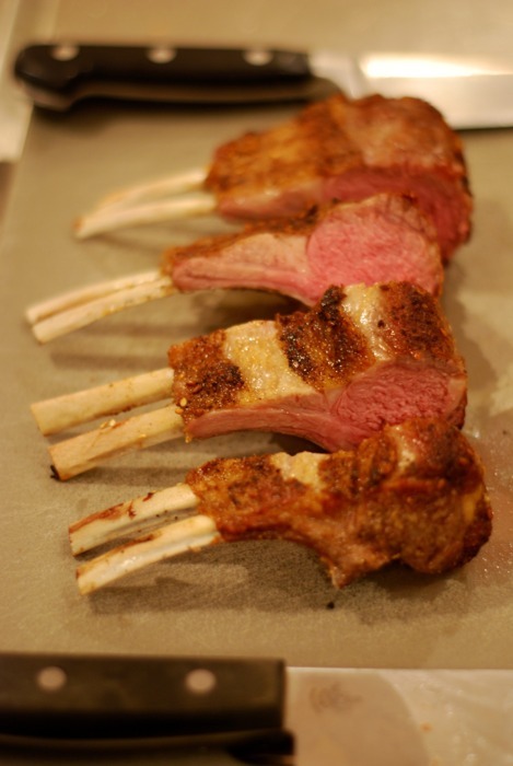 A rack of lamb cut into 4 pieces.
