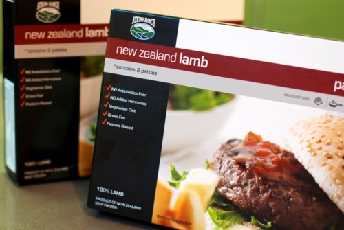 A package of frozen New Zealand lamb burger patties.