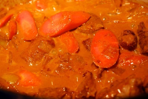 Close up of Whole30 Rogan Josh lamb stew in a Dutch oven.
