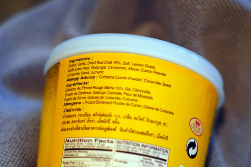 A shot of the packaging of a Thai yellow curry paste to show the paleo-friendly ingredients.